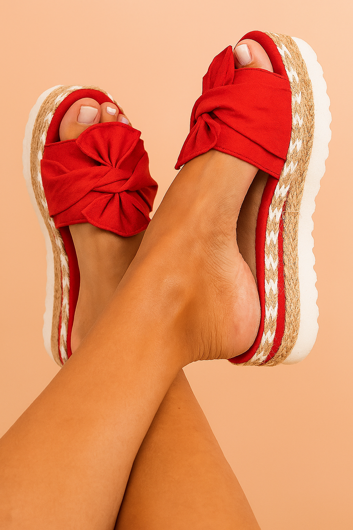 Lovely | Platform flip-flops with a bow